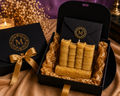 The Archivist handcrafted sculptural candle by My Melodys Candles presented in a premium black gift box with gold ribbon