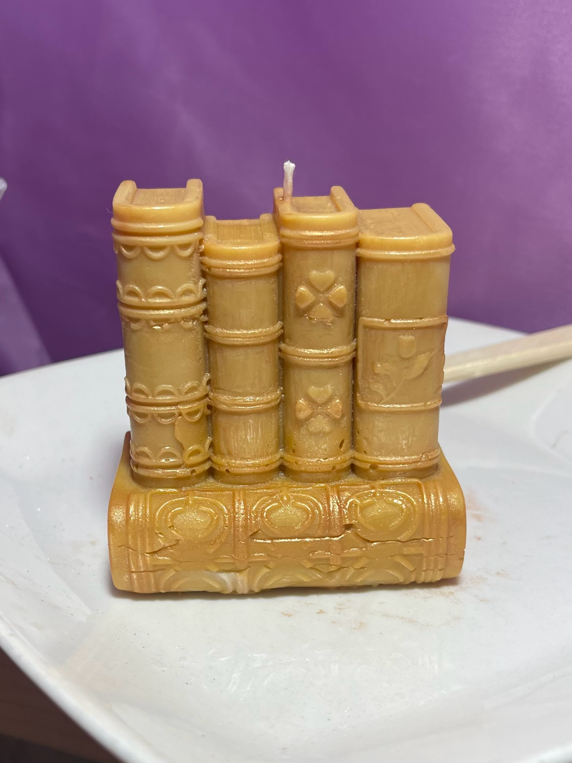 The Archivist luxury soy and beeswax sculptural candle shaped as stacked books by My Melodys Candles